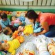 Caring for babies at an orphanage.